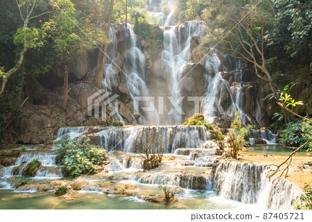 Beautiful landscape of Kuang Si falls an iconic waterfalls with a 60 metres drop in the jungle park nearly Luang Prabang town, in north central Laos. 87405721