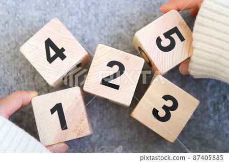 Rank: Block with numbers written on it 87405885