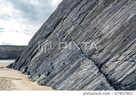 Huge rocks at the Silver Strand in County Donegal - Ireland Huge rocks at the Silver Strand in County Donegal - Ireland 87407902