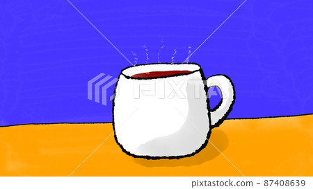 Steam is rising from the hot drink on the table 87408639