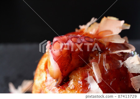 Takoyaki with visible octopus Takoyaki with visible octopus 87413729