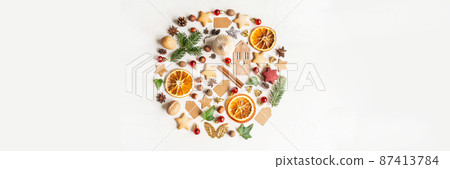 Round knolling composition of various items and food related to Christmas Round knolling composition of various items and food related to Christmas 87413784