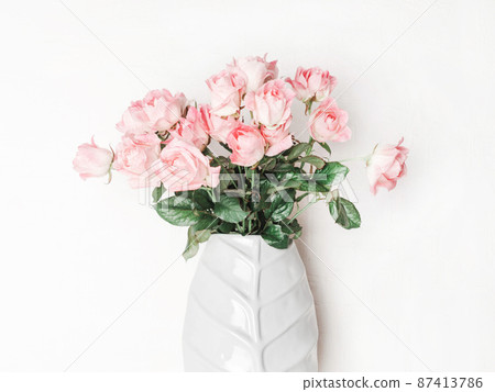 Bouquet of pink roses in ceramic vase. Bouquet of pink roses in ceramic vase. 87413786