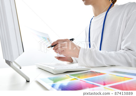 Business woman working with color charts 87413889