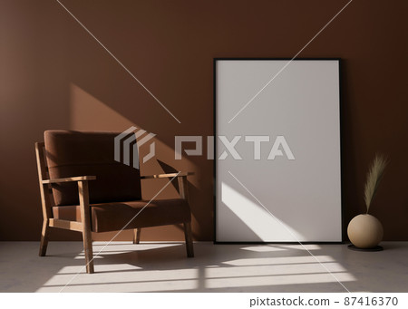 Empty vertical picture frame standing on the floor in modern living room. Mock up interior in contemporary style. Free space for picture, poster. Brown armchair, vase with pampas grass. 3D rendering. Empty vertical picture frame standing on the floor in modern living room. Mock up interior in contemporary style. Free space for picture, poster. Brown armchair, vase with pampas grass. 3D rendering. 87416370