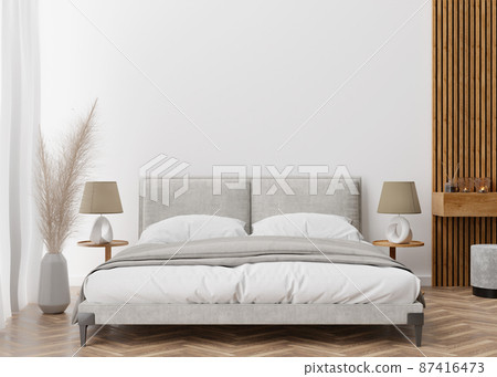 Empty white wall in modern and cozy bedroom. Mock up interior in contemporary style. Free space, copy space for your picture, text, or another design. Bed, lamps, parquet, pampas grass. 3D rendering. Empty white wall in modern and cozy bedroom. Mock up interior in contemporary style. Free space, copy space for your picture, text, or another design. Bed, lamps, parquet, pampas grass. 3D rendering. 87416473