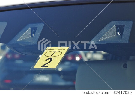 Vehicle inspection label for light vehicles affixed to the windshield 87417030