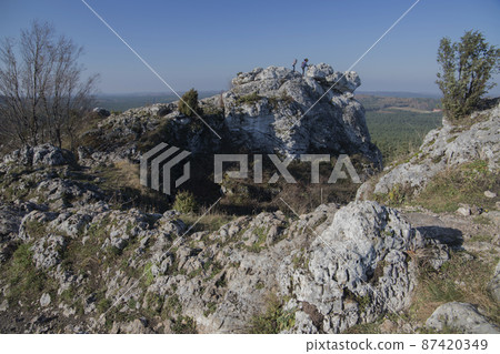 Limestone rocks in Podlesice, Silesian Voivodeship, Poland. Upland Krakow-Czestochowa. 87420349