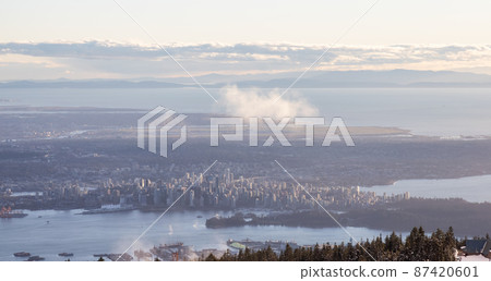 View of Top of Grouse Mountain Ski Resort with the City in the background View of Top of Grouse Mountain Ski Resort with the City in the background 87420601