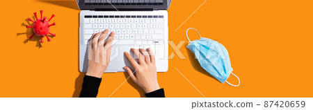Laptop computer with a facial mask 87420659