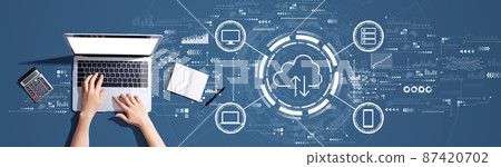 Cloud computing with person using a laptop 87420702