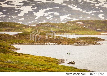 People canoeing in lake People canoeing in lake 87421764