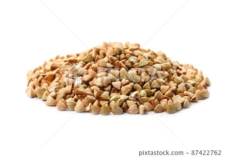 Pile of green buckwheat isolated on white Pile of green buckwheat isolated on white 87422762