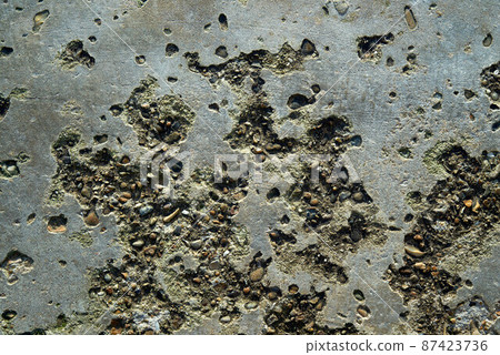 Rough and highly textured concrete surface Rough and highly textured concrete surface 87423736