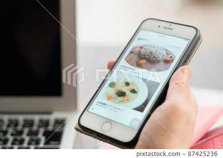 Image delivery office with a smartphone Image delivery office with a smartphone 87425236