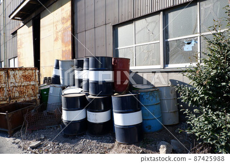 Drums placed in the corner of the factory 87425988
