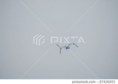 Far shadow of the MV-22 Osprey in flight Far shadow of the MV-22 Osprey in flight 87426955