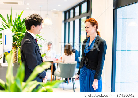 Overseas guests checking in at the hotel Overseas guests checking in at the hotel 87430342