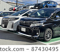 Multiple cars parked 87430495