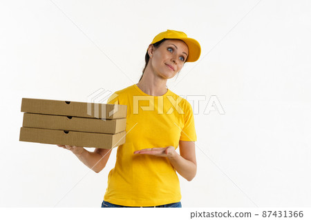 Woman in yellow pizza delivery girl on white background 87431366