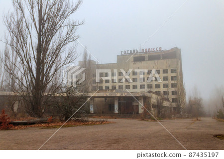 Abandoned building of Polissya hotel in the ghost town Pripyat in Chernobyl Exclusion Zone, Ukraine. Inscription in Ukrainian Abandoned building of Polissya hotel in the ghost town Pripyat in Chernobyl Exclusion Zone, Ukraine. Inscription in Ukrainian 87435197