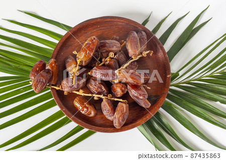 Dried dates (fruit of Phoenix dactylifera dates). Clipping paths for both the object and the shadow. Infinite depth of field, retouched. Set, bundle, Dried dates (fruit of Phoenix dactylifera dates). Clipping paths for both the object and the shadow. Infinite depth of field, retouched. Set, bundle, 87435863