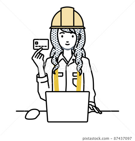 A woman at a construction site sitting at a desk and using a PC while holding a credit card A woman at a construction site sitting at a desk and using a PC while holding a credit card 87437097