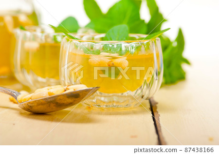 Arab traditional mint and pine nuts tea 87438166