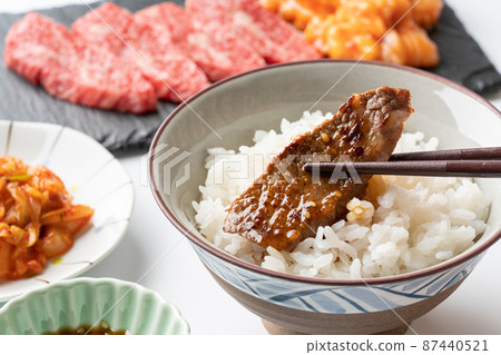 Grilled meat with rice balls 87440521