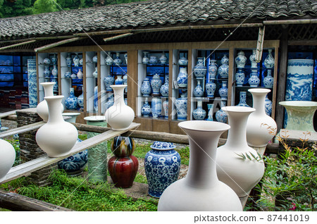 Clay pottery drying in old traditional pottery workshop in Jingdezhen, China Clay pottery drying in old traditional pottery workshop in Jingdezhen, China 87441019