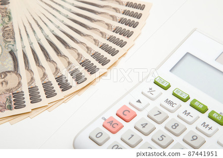 Money and calculator 87441951