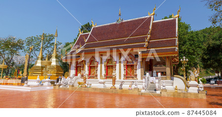 Two golden pagodas at Wat Phra That Doi Tung, Chiang Rai province, Thailand. Two golden pagodas at Wat Phra That Doi Tung, Chiang Rai province, Thailand. 87445084