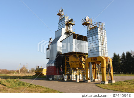 Grain processing plant. Processing and sifting corn and grain after harvesting. Grain processing plant. Processing and sifting corn and grain after harvesting. 87445948