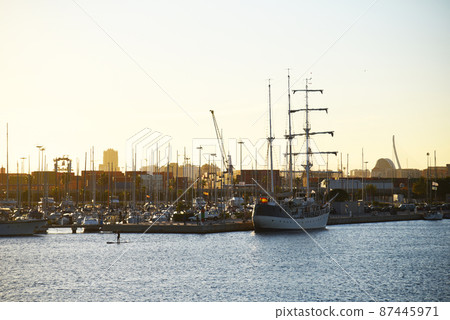 Yachts and motor boats in La Marina de Valencia. Yachts and motor boats in La Marina de Valencia. 87445971