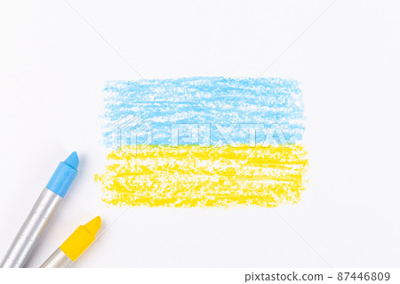 Ukrainian flag painted on white paper with wax crayons Ukrainian flag painted on white paper with wax crayons 87446809