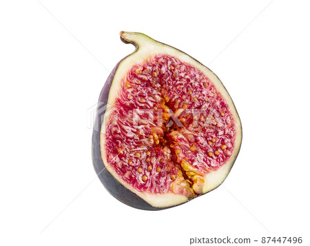 Half of a purple fig isolated on white background with copy space. Soft, sweet fruit, skin is thin, red flesh has many seeds inside of it. Close-up. Half of a purple fig isolated on white background with copy space. Soft, sweet fruit, skin is thin, red flesh has many seeds inside of it. Close-up. 87447496