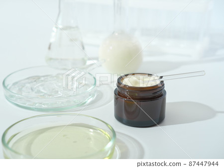 laboratory dishes and glassware on a lab table. fermentation, fermented beauty skin care. enzyme serum for anti age treatment. laboratory dishes and glassware on a lab table. fermentation, fermented beauty skin care. enzyme serum for anti age treatment. 87447944