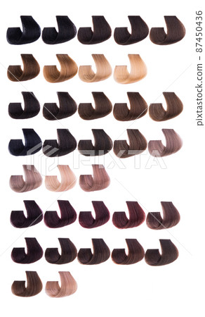 dyed curl of hair isolated 87450436