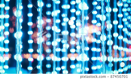 Blue string lights, wood background lightbulbs bokeh merry Christmas street lighting in street party in town garden evening people happy night street bokeh festival on streetlight vibrant bulb party Blue string lights, wood background lightbulbs bokeh merry Christmas street lighting in street party in town garden evening people happy night street bokeh festival on streetlight vibrant bulb party 87450701
