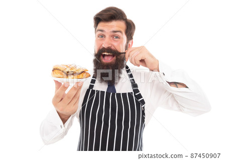 Fantastic for your taste buds. Happy chef serving croissant. Pastry chef twirl mustache. Dessert man Fantastic for your taste buds. Happy chef serving croissant. Pastry chef twirl mustache. Dessert man 87450907
