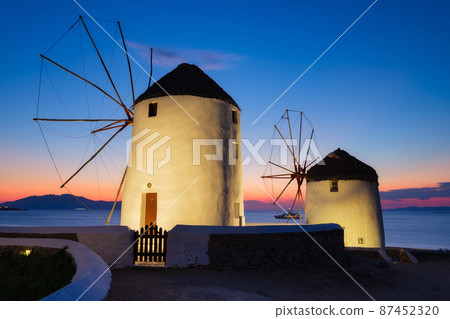 Mykonos, Greece. Traditional windmills. The symbol of Mykonos during sunset. Mykonos, Greece. Traditional windmills. The symbol of Mykonos during sunset. 87452320