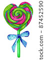 Caramel lollipop in the shape of a heart on a stick with a bow, striped candy. Watercolor food illustration isolated on white. Design for fabric, wallpaper, menu, packaging, print, baby room. 87452590