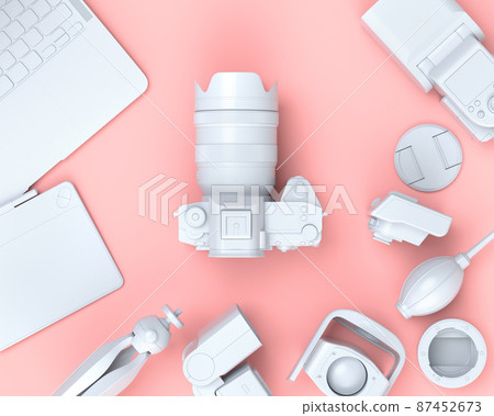 Top view of designer workspace and photography gear on black table background 87452673