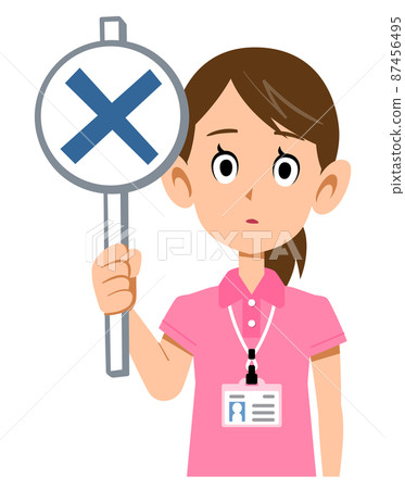 A gesture of holding an incorrect tag for a female staff member wearing a short-sleeved polo shirt and a name tag 87456495