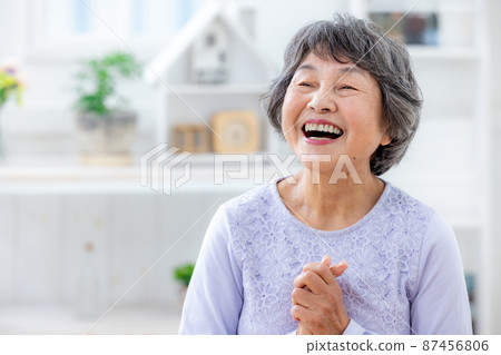 Senior woman face smile 87456806