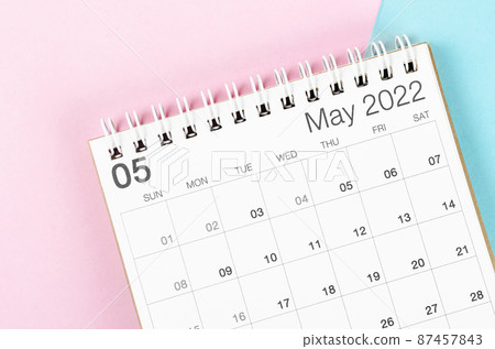 May 2022 desk calendar on beautiful background. 87457843