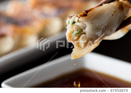 Dumplings with plenty of gravy 87458874