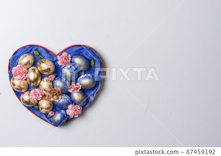 Happy easter time. Bright Easter holiday concept with spring flowers and easter eggs. Colorful Easter eggs background Happy easter time. Bright Easter holiday concept with spring flowers and easter eggs. Colorful Easter eggs background 87459192