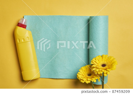 Cleaning service concept. Spring cleaning. Cleaning chemical bottles and supplies. House cleaning concept on colored background Cleaning service concept. Spring cleaning. Cleaning chemical bottles and supplies. House cleaning concept on colored background 87459209