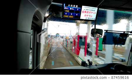 From inside the highway bus passing through the tollhouse From inside the highway bus passing through the tollhouse 87459616